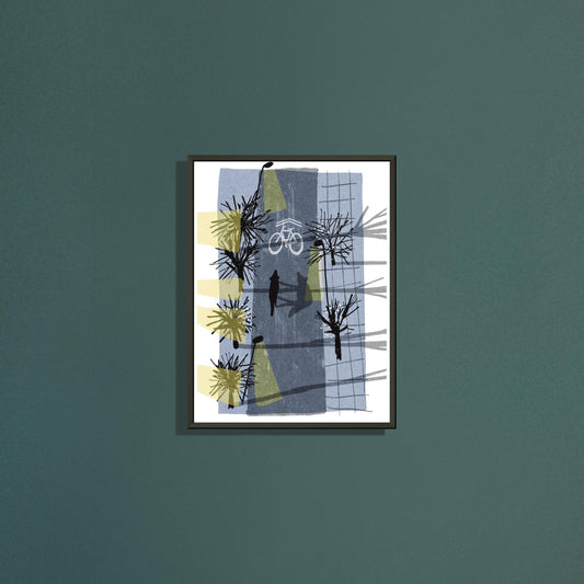 Cycle lane art print by Magda Brol in a black metal frame on a dark green wall