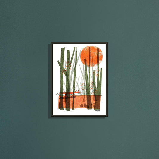 Fox’s walk art print by Magda Brol in a black metal frame on a dark green wall
